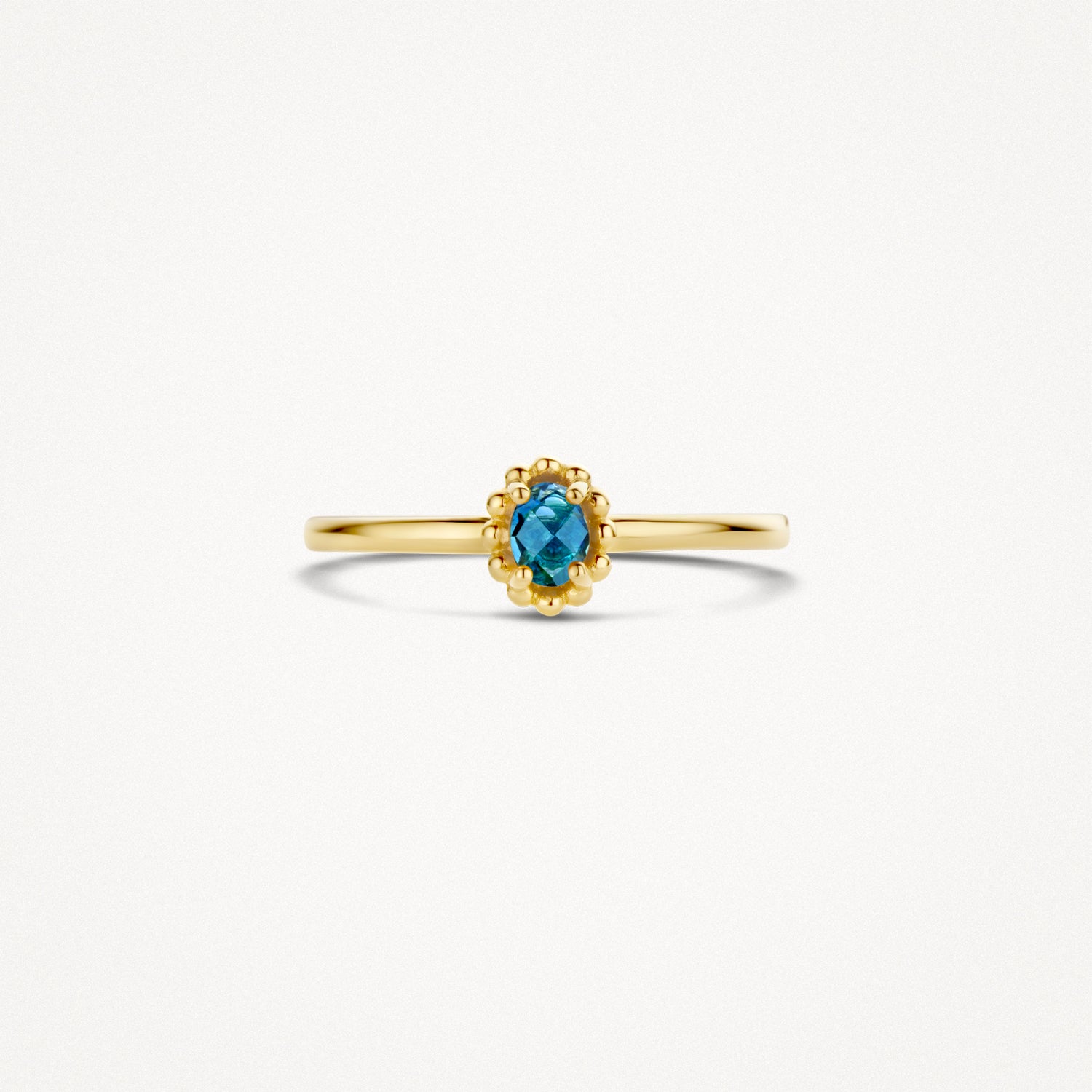 Ring met blauwe topaas en bolletjesmotief 14k goud
