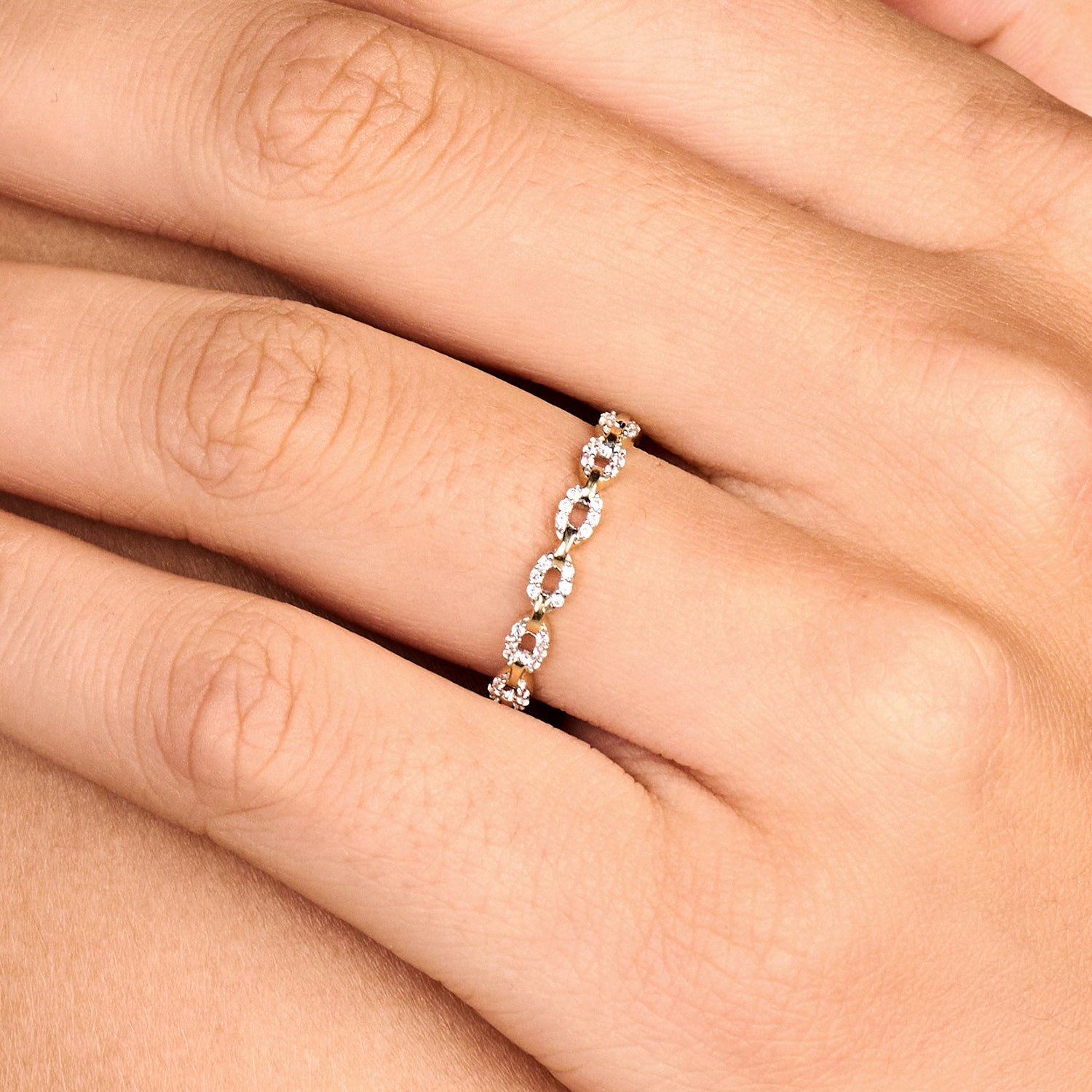 Bague à maillons pavés de zircones deux ors 14 carats