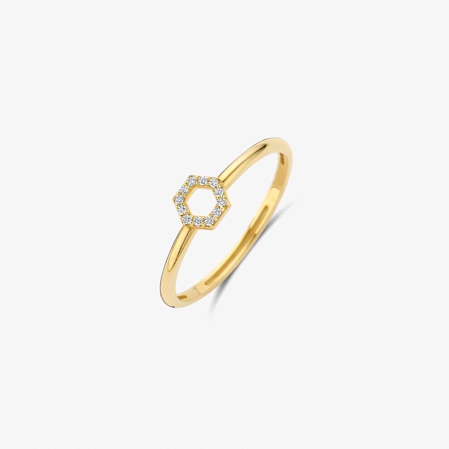 Bague en or jaune 14 carats avec des Zircone clairs en pente, vue de profil.