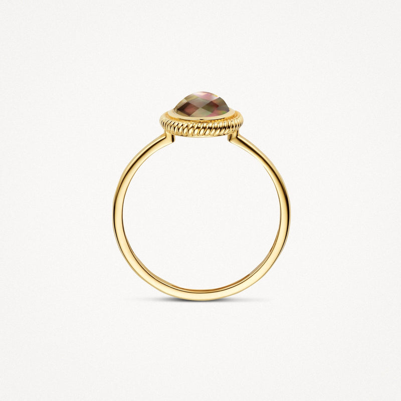 14ct yellow gold ring with an oval Black mother-of-pearl, worn on the finger.