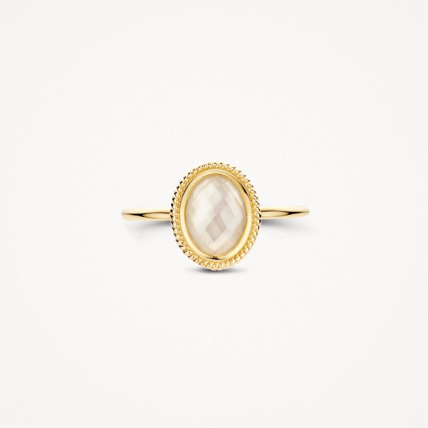 Bague en or jaune 14 carats Bague sertie d'une pierre blanche ovale Nacre, vue de profil.