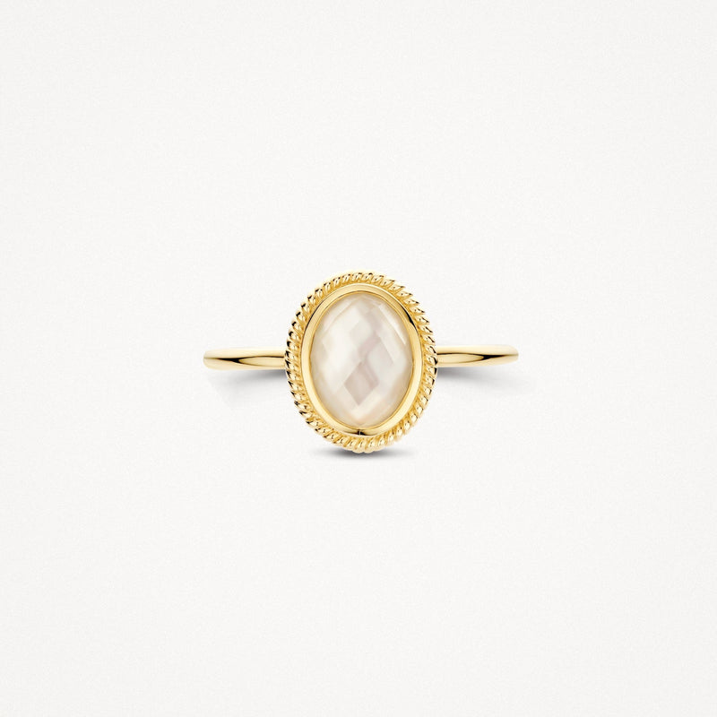 Bague en or jaune 14 carats Bague sertie d'une pierre blanche ovale Nacre, vue de profil.