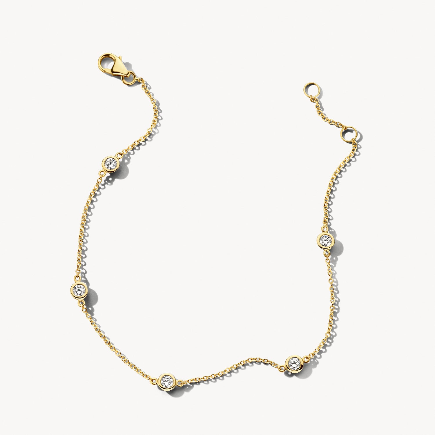 Armband 5 zirkonia gladomzetting 14k goud