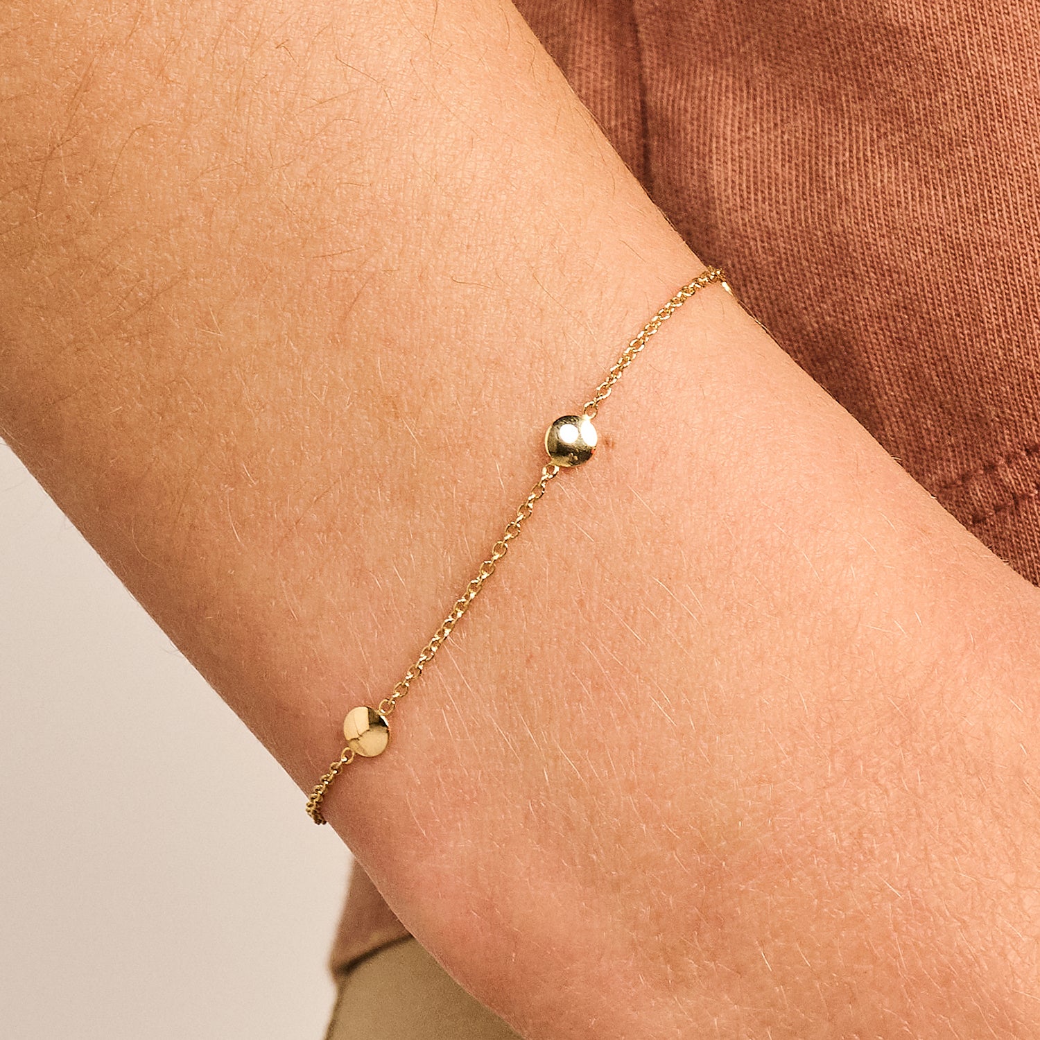 Armband gladde bedeltjes 14k goud