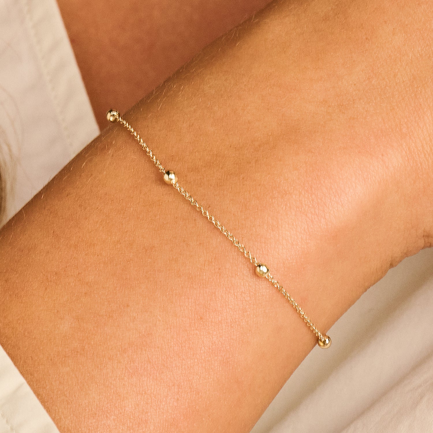 Bracelet avec boules en or jaune 14 carats