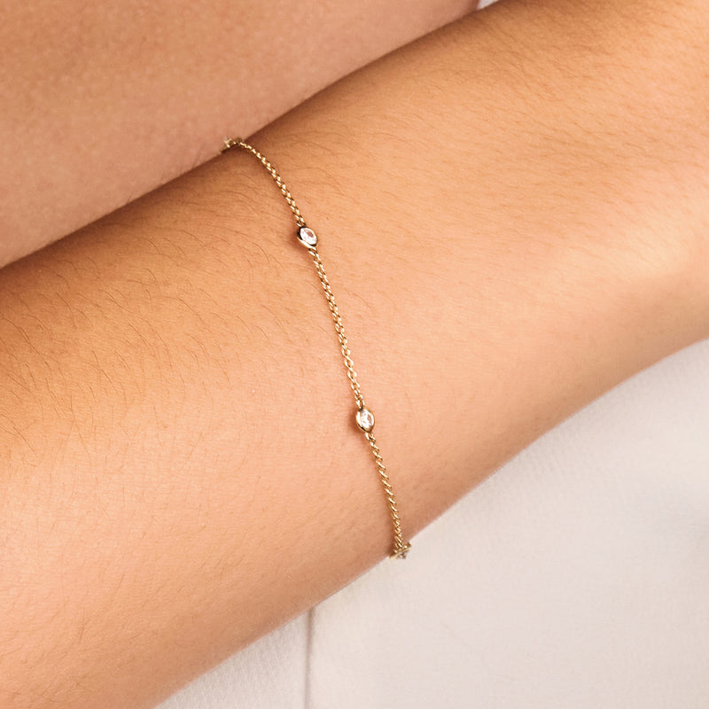 Bracelet avec zircones de 3,4 mm serti clos or jaune 14 carats