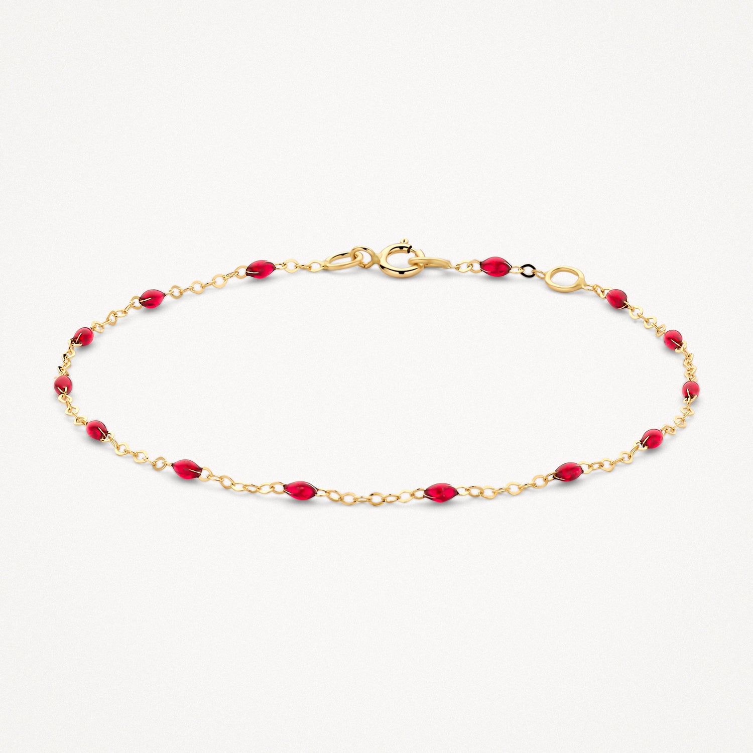 Armband van 14k goud met kleine ovale rode resin schakels en fijne schakelketting.