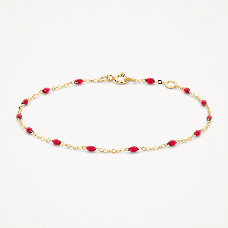 Armband van 14k goud met kleine ovale rode resin schakels en fijne schakelketting.