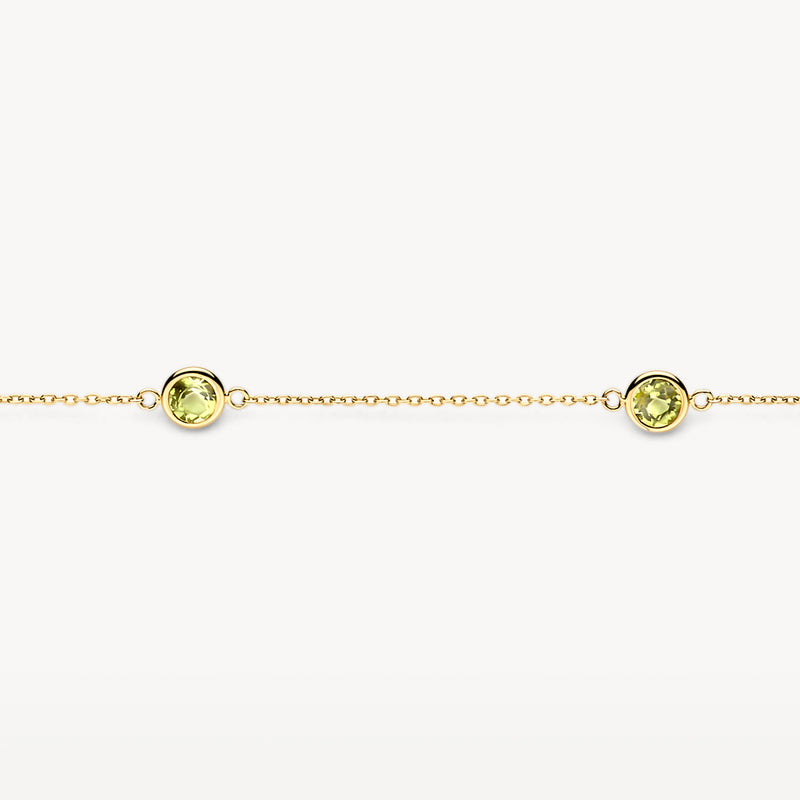 Fijne 14k goud armband met drie peridoot stenen in ronde zetting.