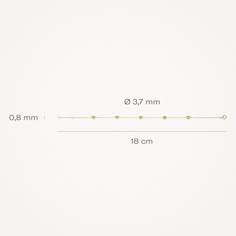 Dunne 14k goud armband met kleine peridot kralen, 18 cm lang, 0,8 mm breed.