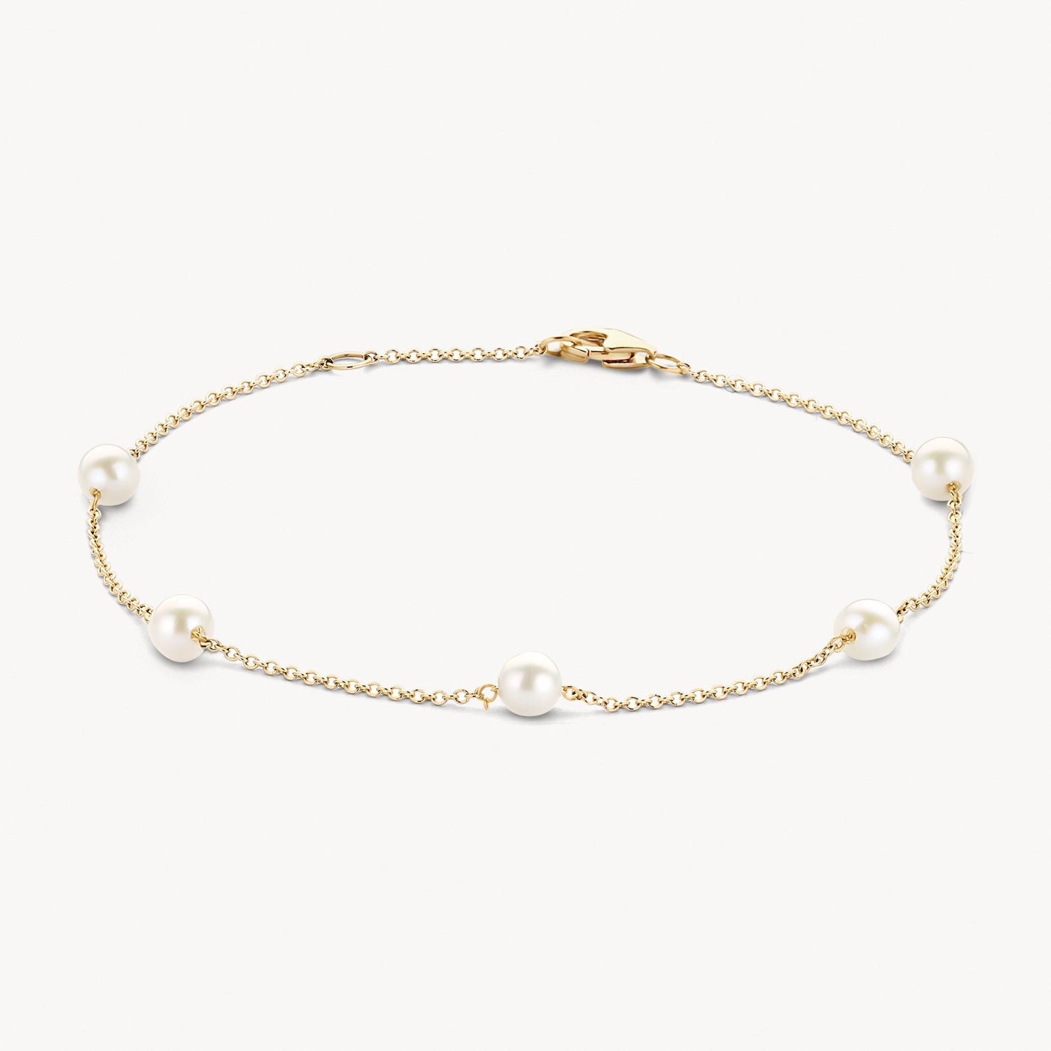 Bracelet à maillons en or jaune 14 carats avec Perle blanc, vue de face.