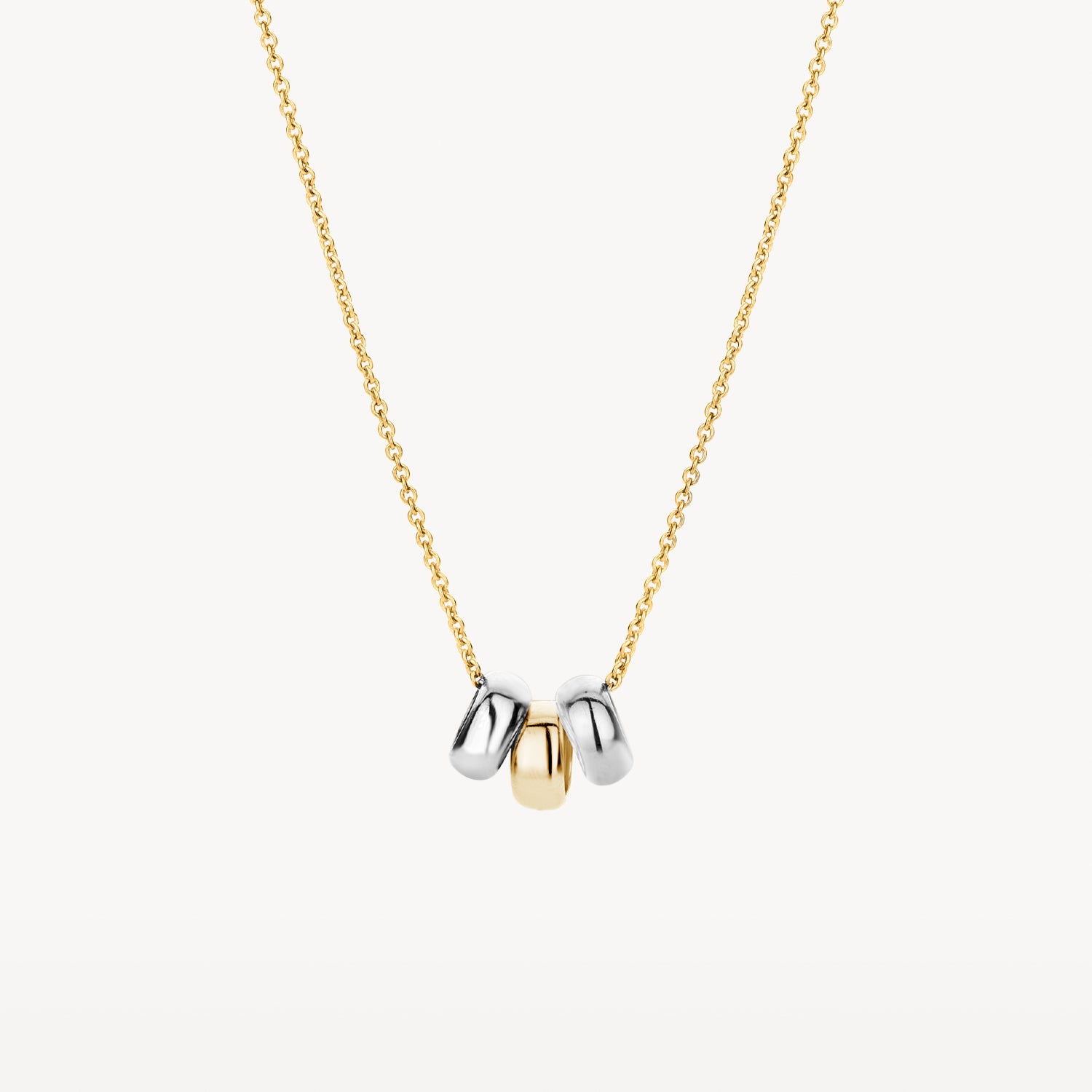 Ketting met 3 ringetjes in 14k bicolor goud