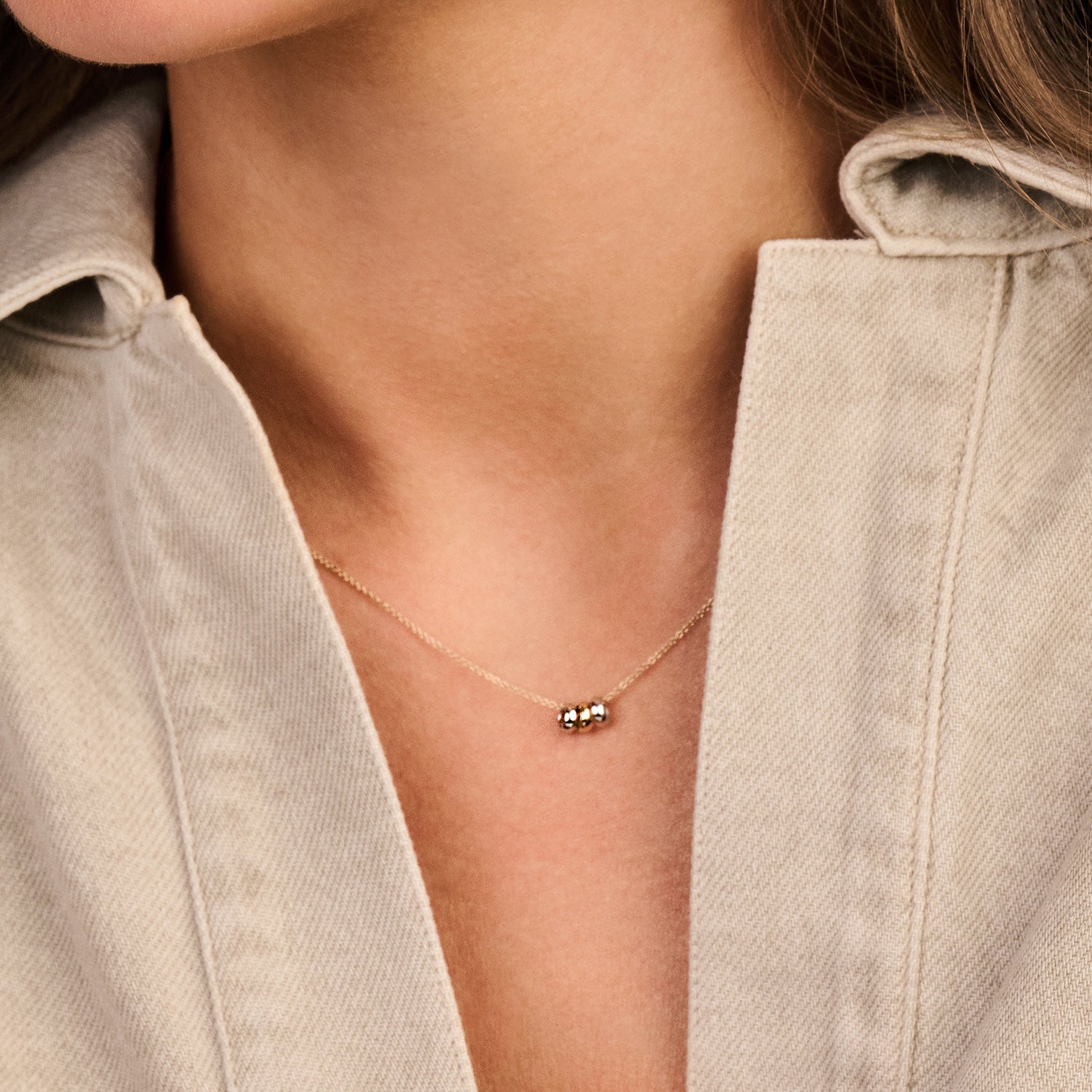 Ketting met 3 ringetjes in 14k bicolor goud