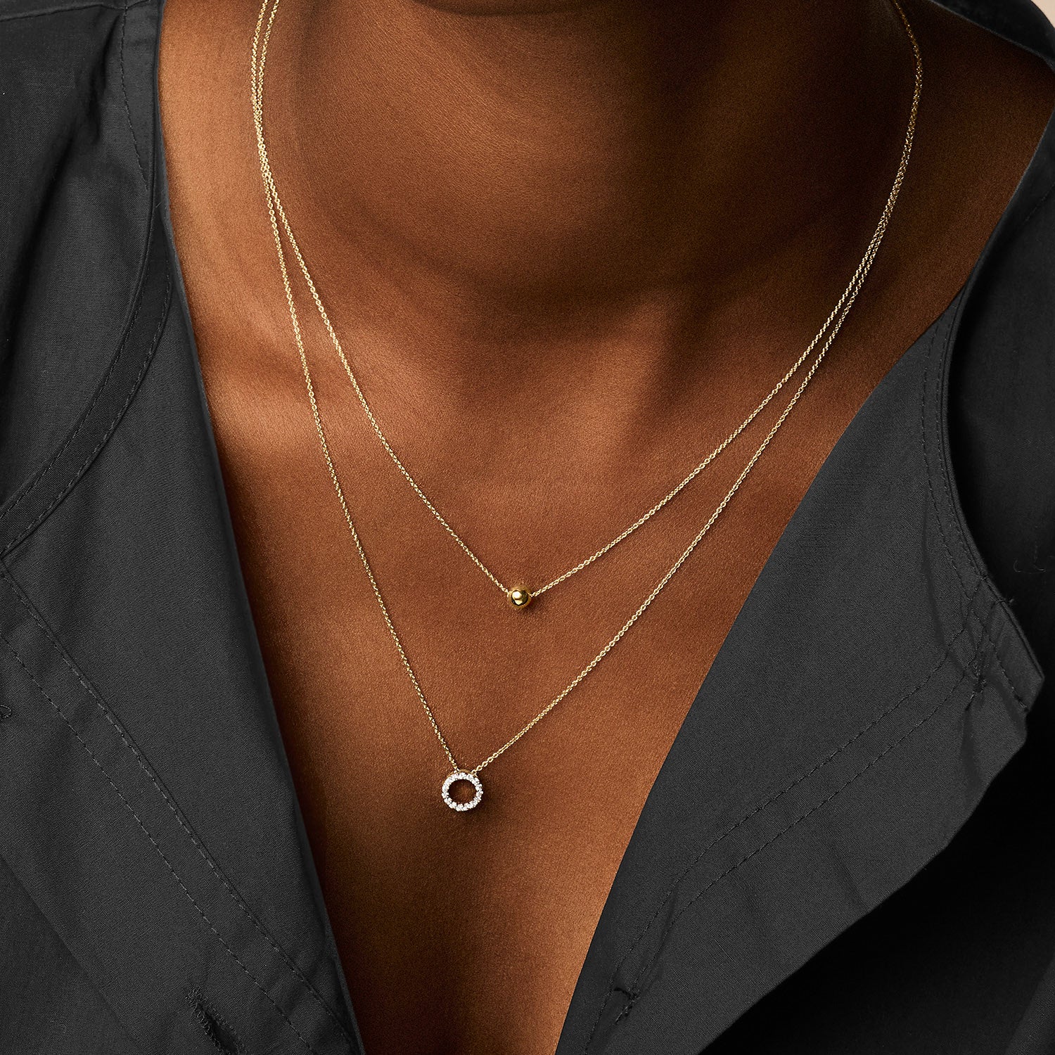 Ketting met balletje hanger 14k goud
