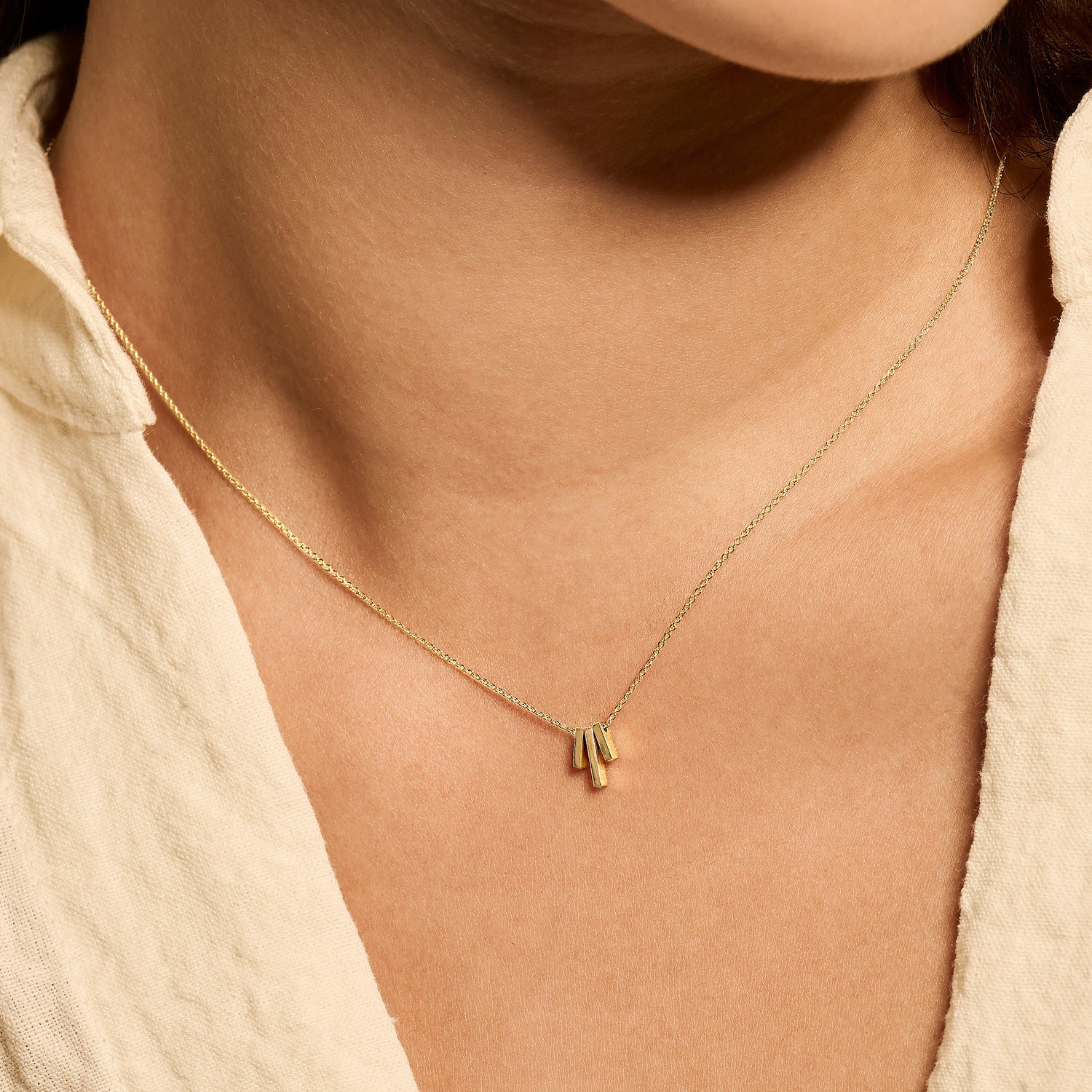 Ketting met drie goudstaafjes 14k goud