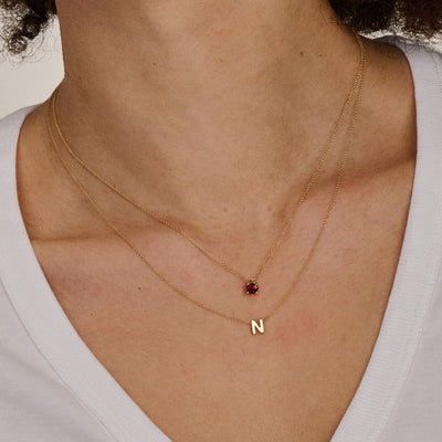 Collier pendentif grenat en or 14 carats