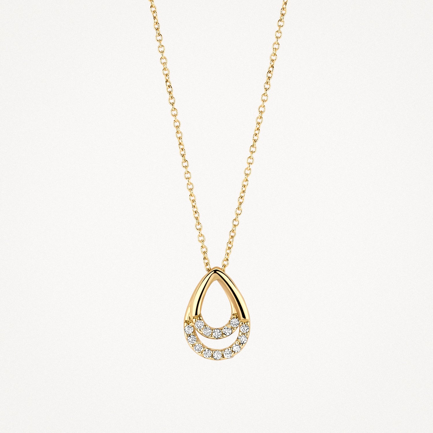 14k goud ketting met druppelvormige hanger en zirkonia stenen.