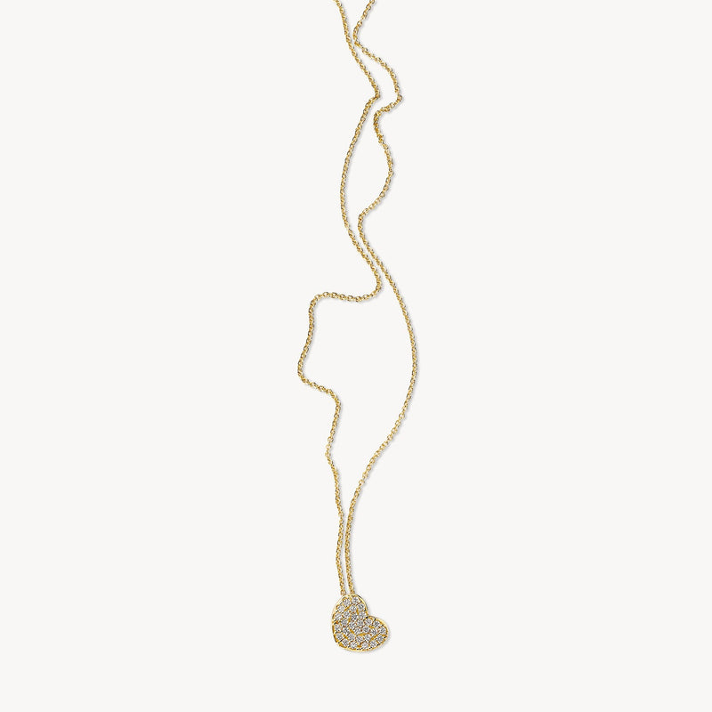 Collier en or jaune 14 carats avec pendentif en forme de cœur Zircone, vue de profil.