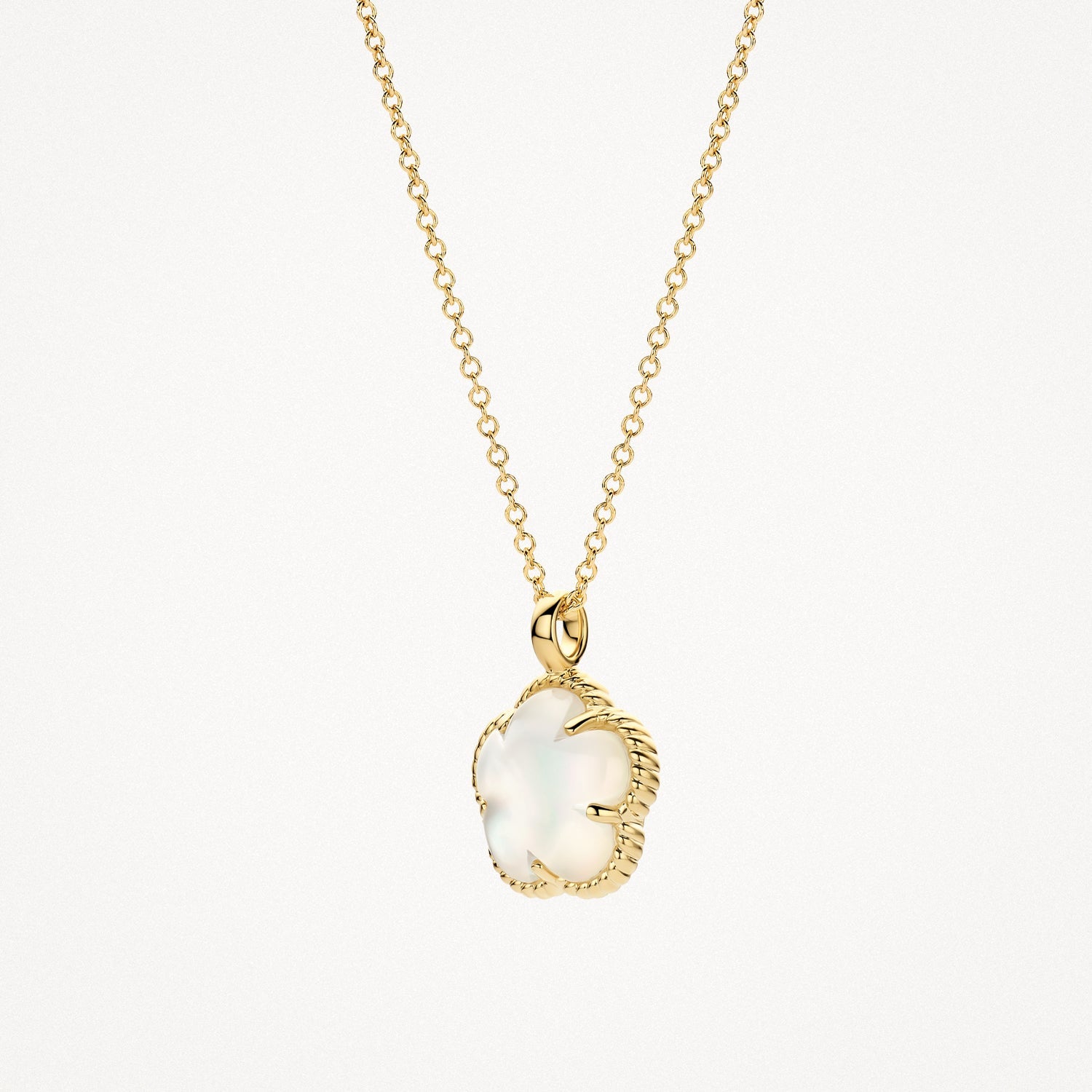 Collier en or jaune 14 carats avec un pendentif blanc Nacre, gros plan.