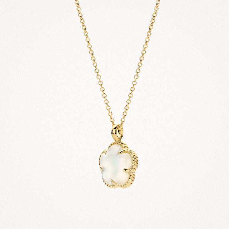 Collier en or jaune 14 carats avec un pendentif blanc Nacre, gros plan.