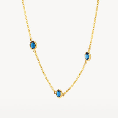 585er Gelbgoldkette mit blauem London-Blue-Topas, Nahaufnahme.