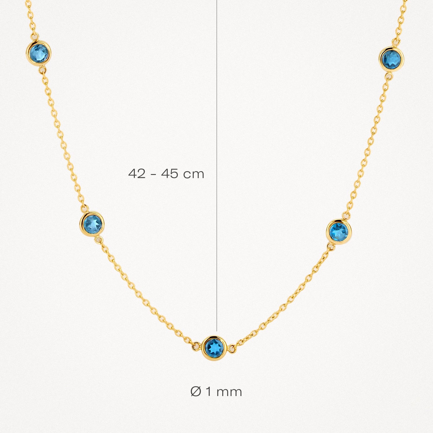 Collier en or jaune 14 carats serti d'une topaze « London Blue », d'une longueur de 42 à 45 cm.