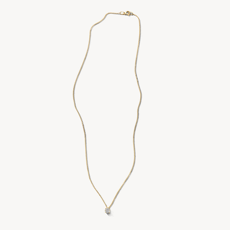 Collier van 14k goud met kleine ronde diamant aan fijne ketting.