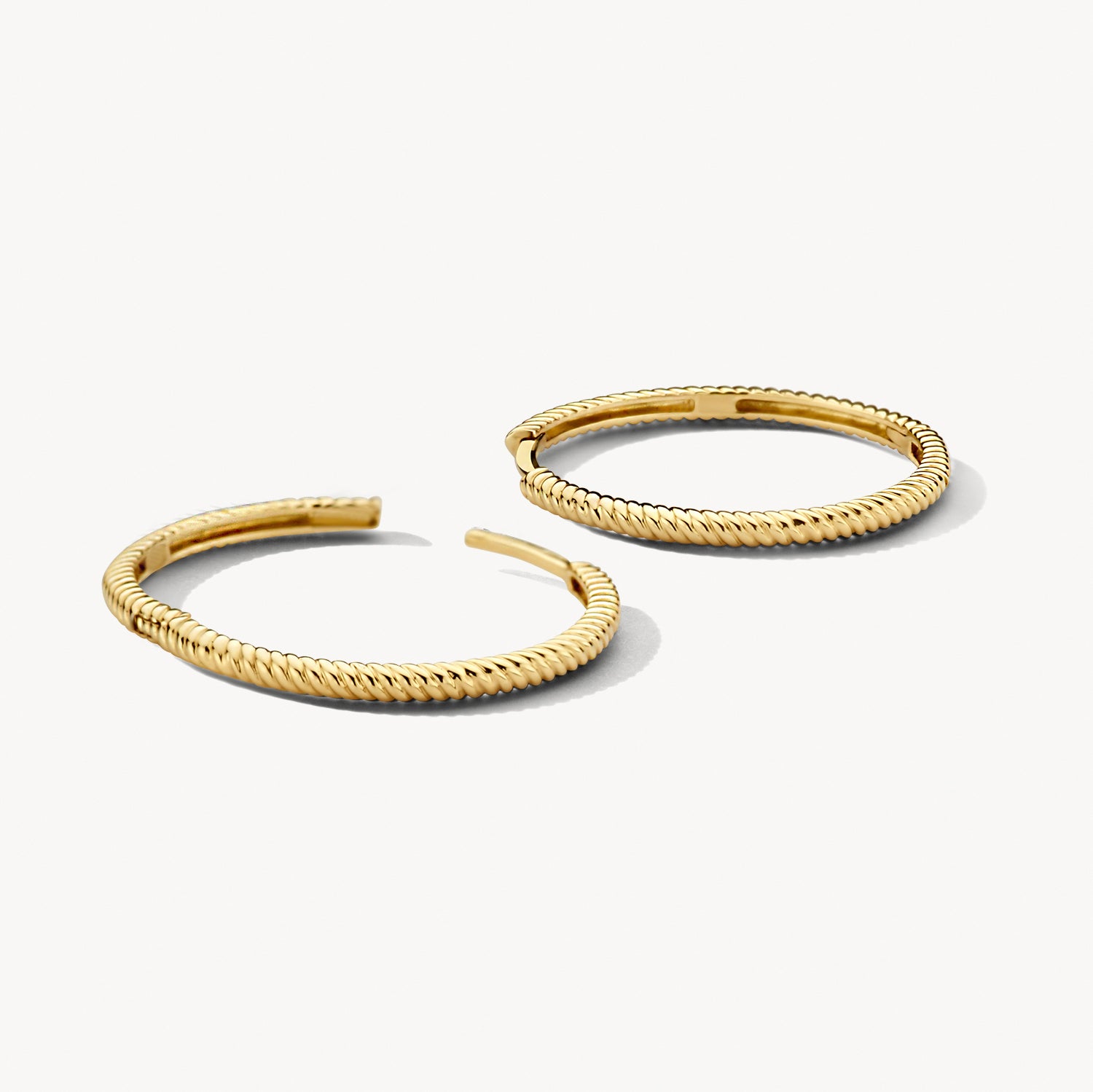 Oorringen met gedraaid motief 20 mm 14k goud