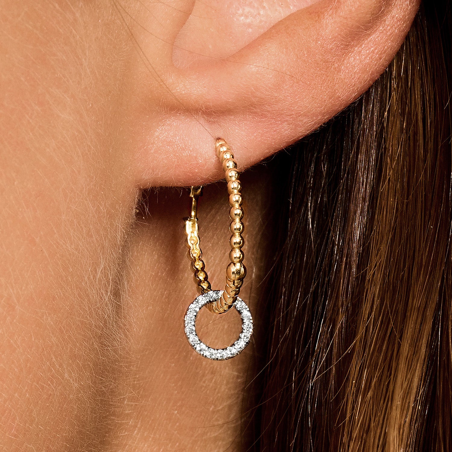 Oorringen met bolletjesmotief 20 mm 14k goud
