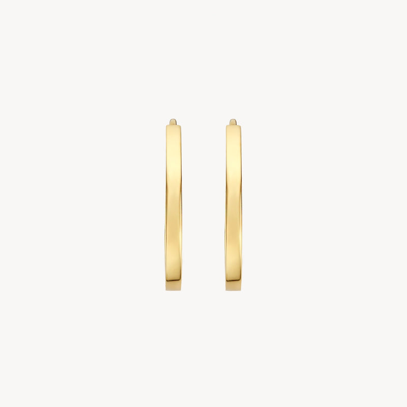 Véritable Créoles en or jaune 14 carats, lisse, vue de profil.