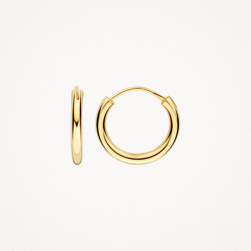 Véritable or jaune 14 carats Créoles, à porter au lobe de l'oreille.