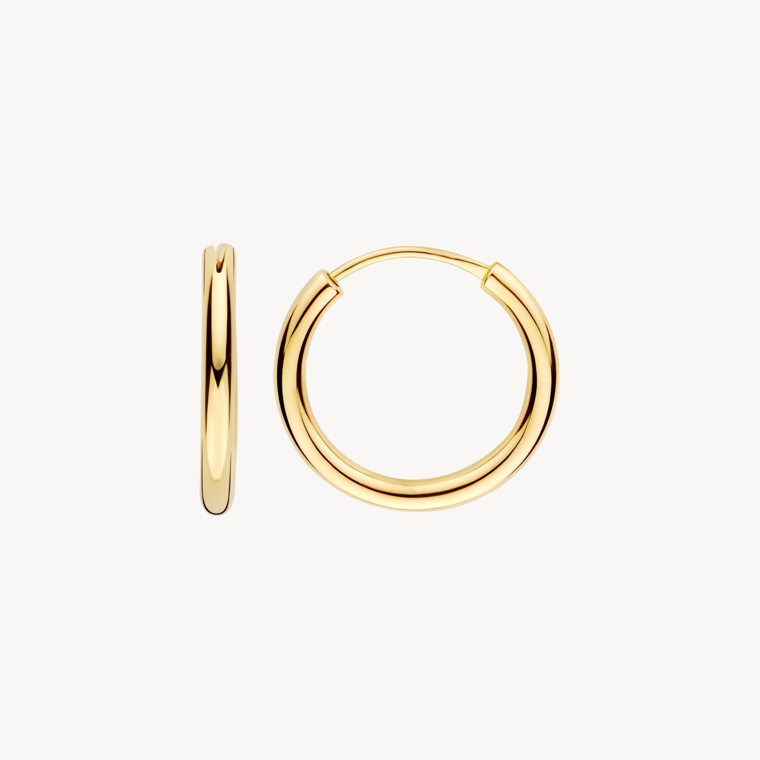 Véritable or jaune 14 carats Créoles, à porter au lobe de l'oreille.