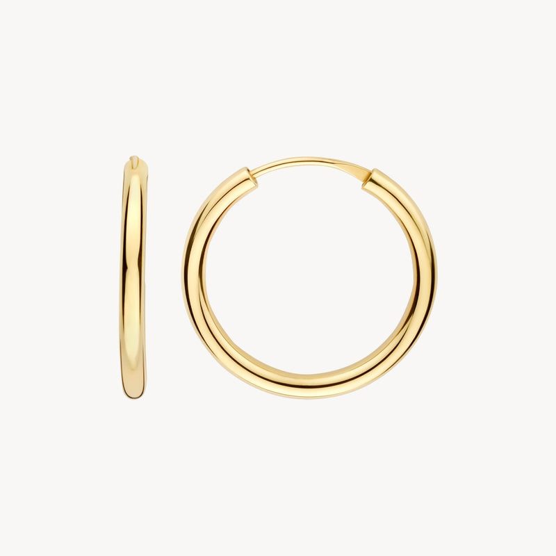 Véritable or jaune 14 carats Créoles, à porter au lobe de l'oreille.