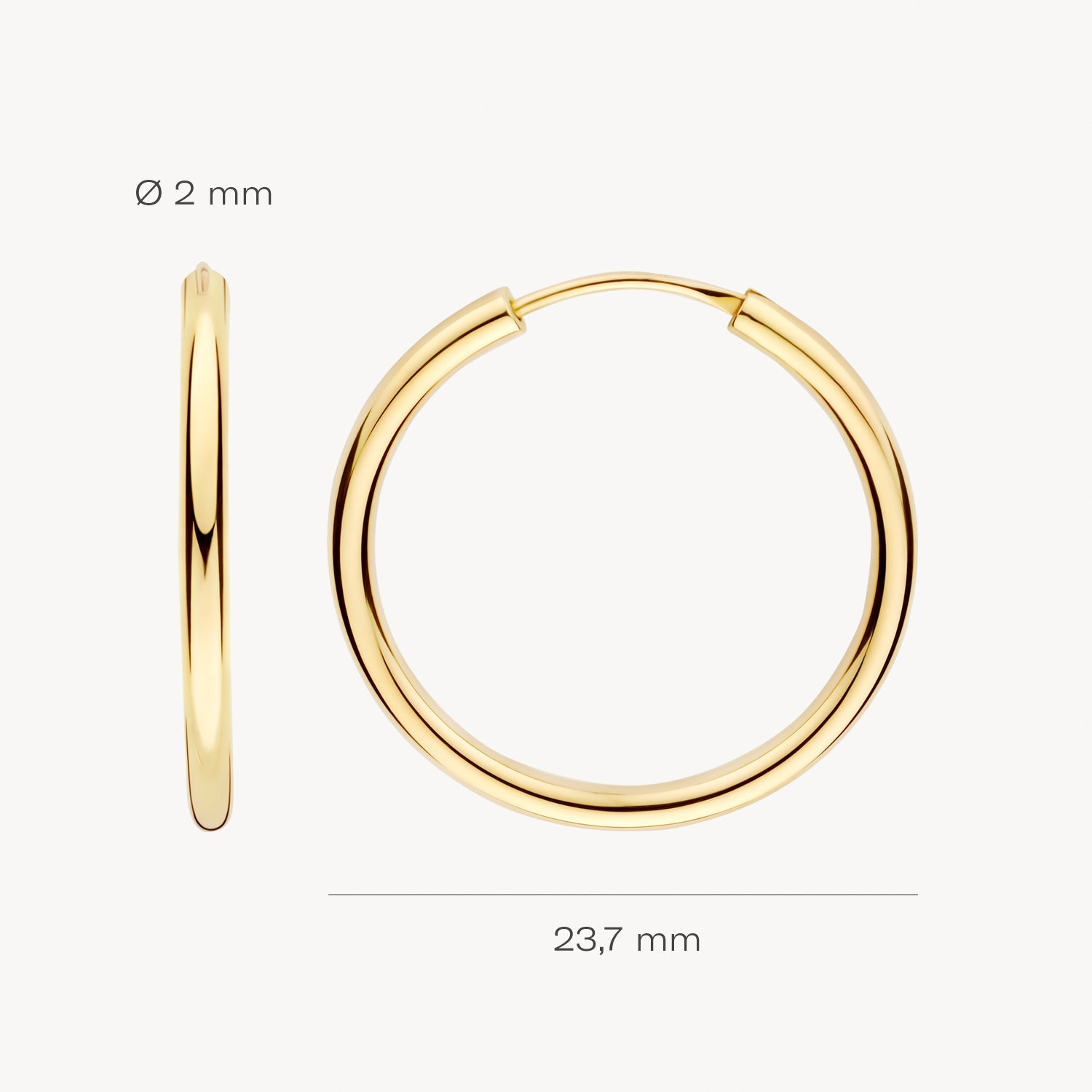 Véritable or jaune 14 carats Créoles, diamètre 23,7 mm, épaisseur 2 mm.
