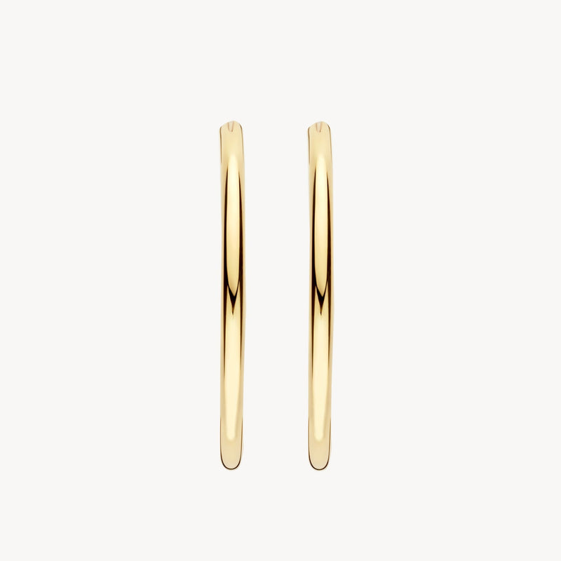 Véritable bague ronde en or jaune 14 carats Créoles avec finition polie, gros plan.