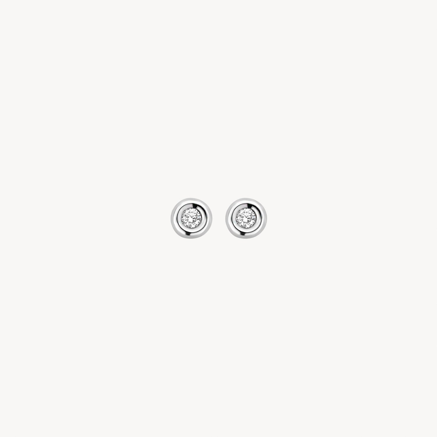 Diamanten oorknopjes in 4.3 mm Gladomzetting 14k Wit goud