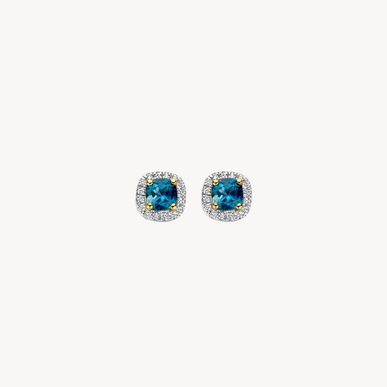 Oorknoppen met blauwe topaas omringd door diamanten 14k goud