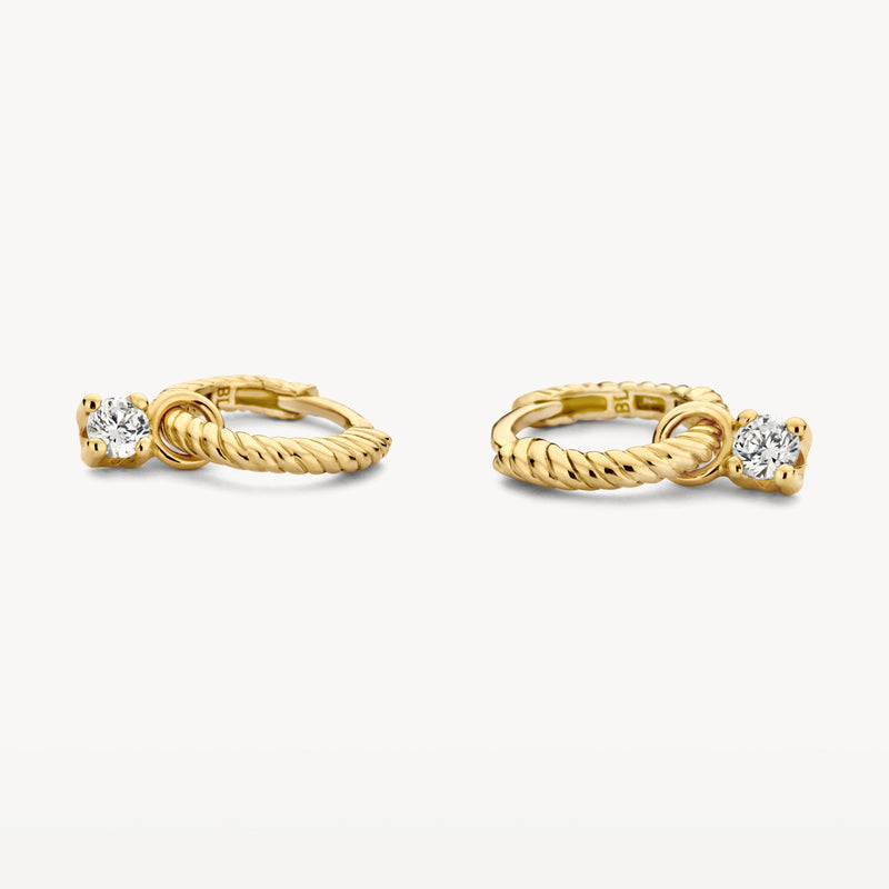 14k goud oorbellen met gedraaide ring en zirkonia steen.