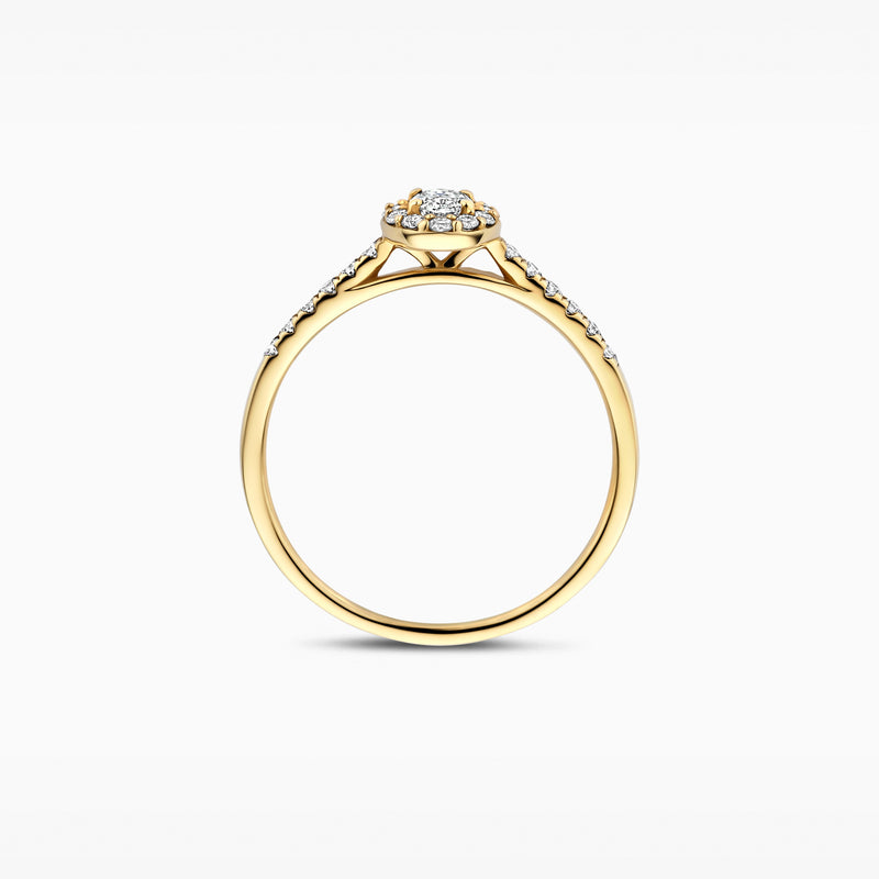 14k goud ring met ronde lab diamond en gedetailleerd zijprofiel.