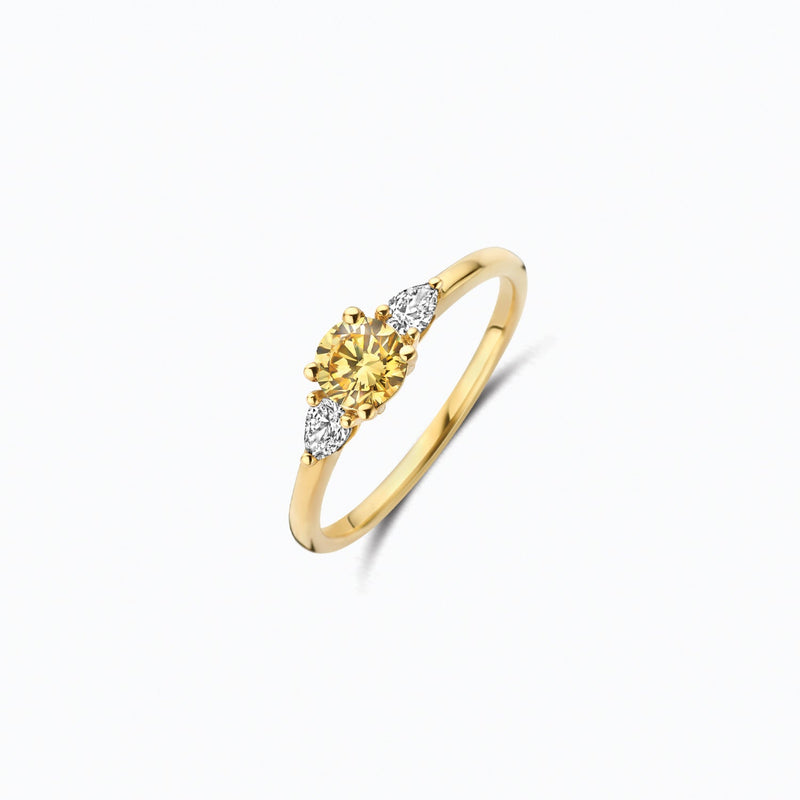 Or jaune 14 carats Bague avec Diamant de synthèse et une pierre jaune, vue de profil.