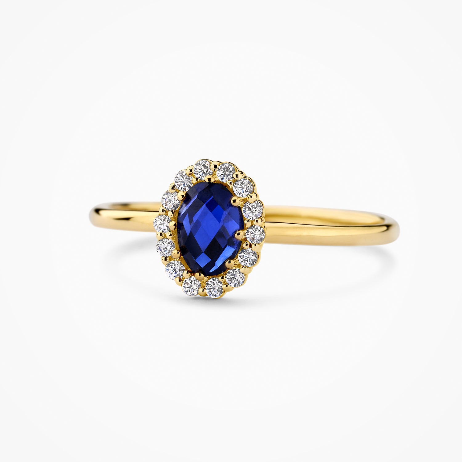 Or 14 carats Jaune et or blanc Bague, avec un diamant synthétique et un diamant bleu, gros plan.