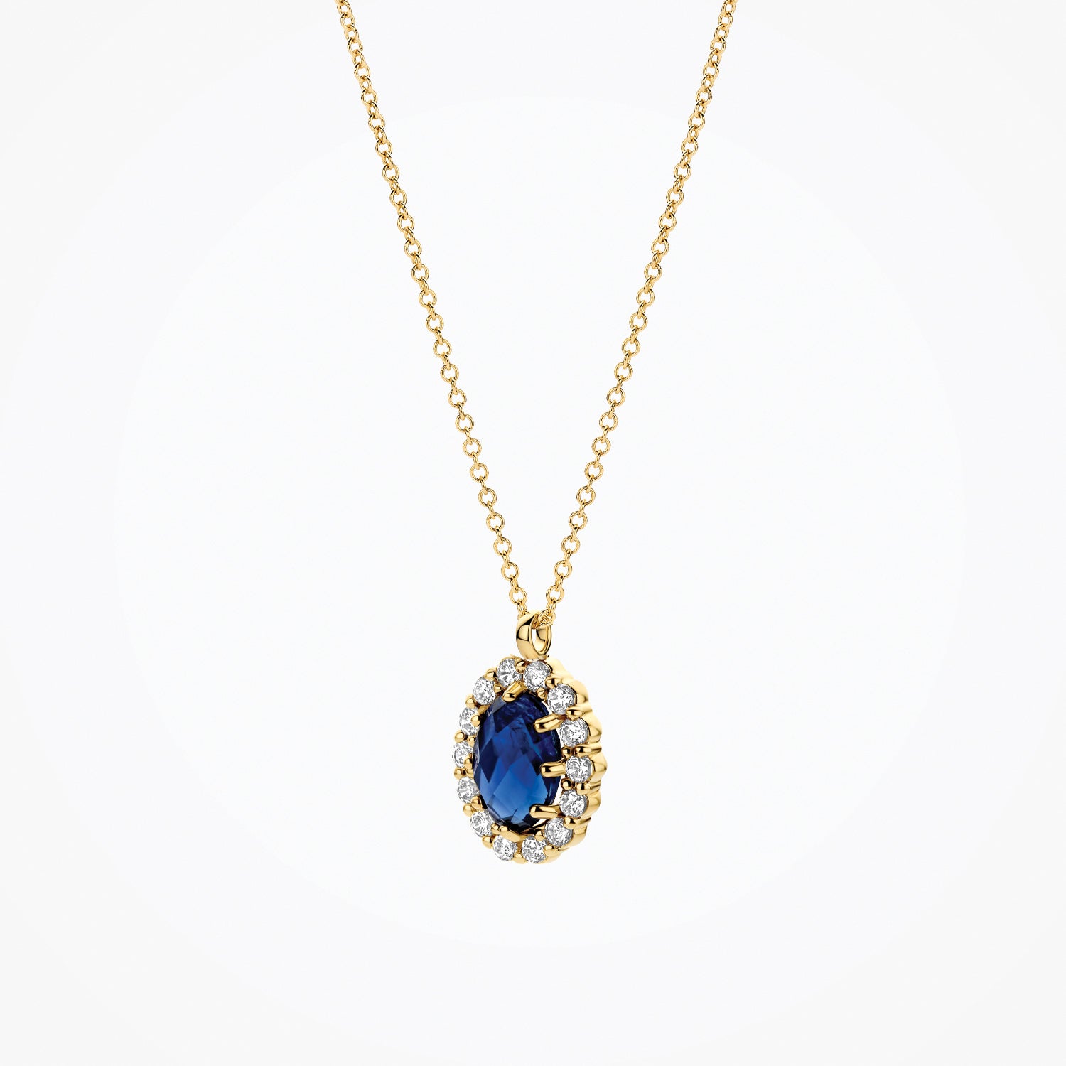 14ct yellow gold Necklace with Lab Grown Diamond and blue Diamond, worn around the neck.