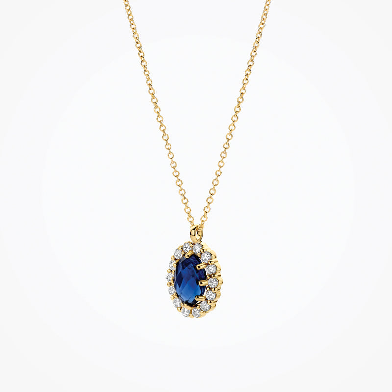 14ct yellow gold Necklace with Lab Grown Diamond and blue Diamond, worn around the neck.