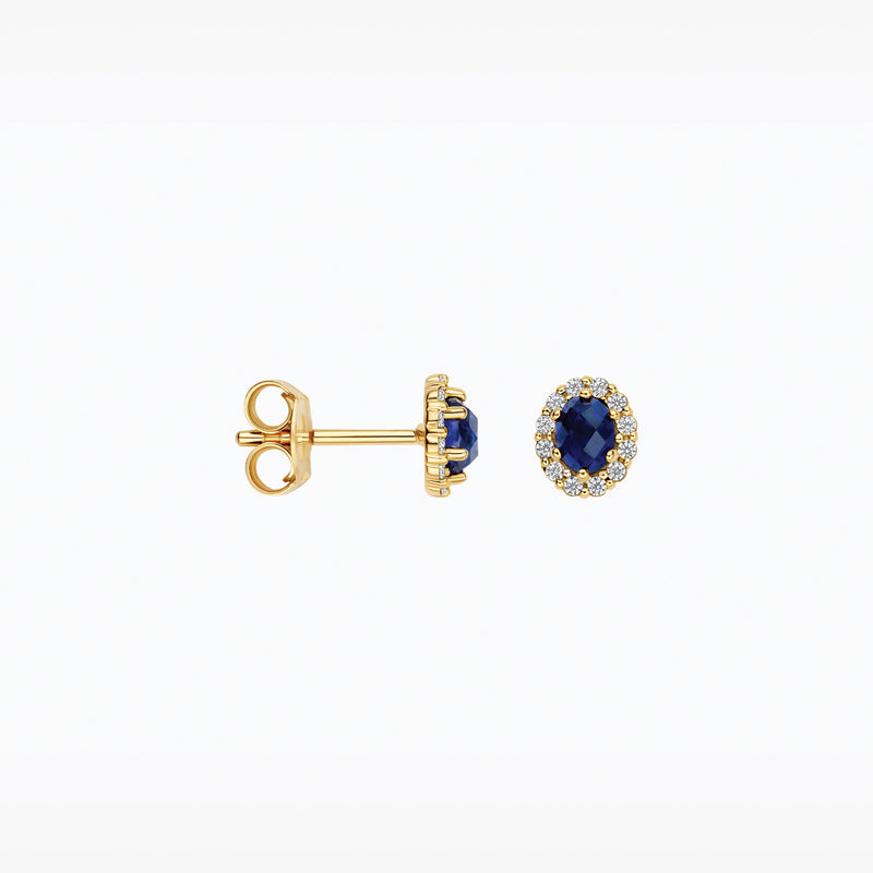 14ct yellow gold stud earrings with lab-grown diamonds, worn on the earlobe.